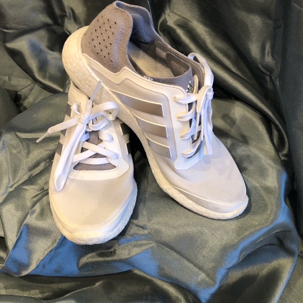 White/silver Adidas Boost women’s running shoes